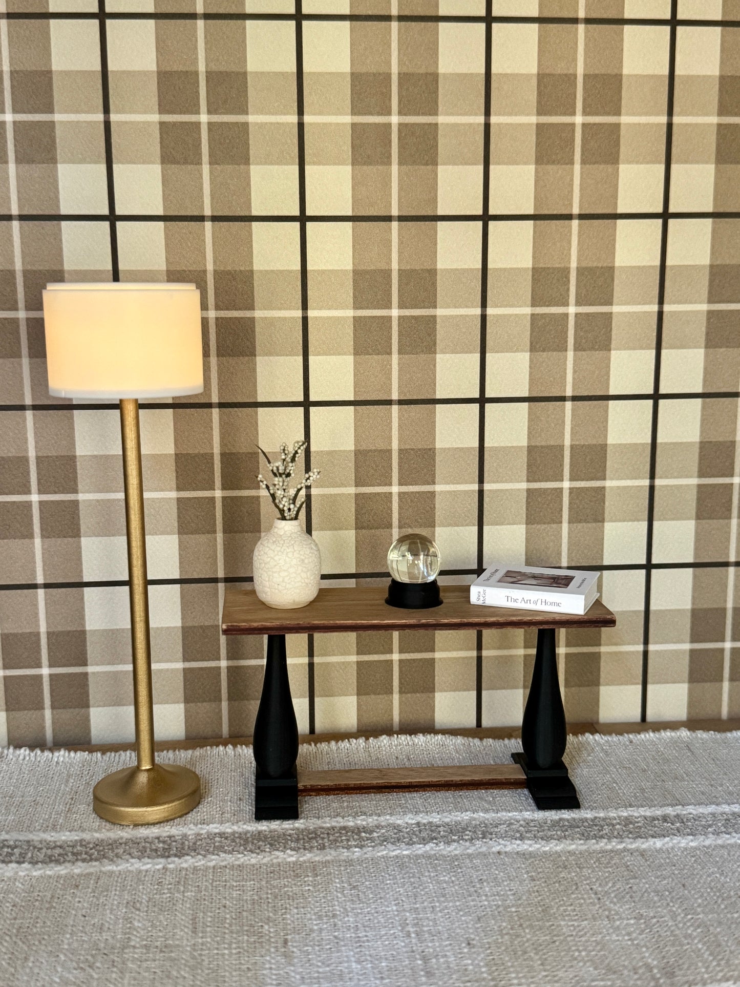 Miniature wood console table with black legs