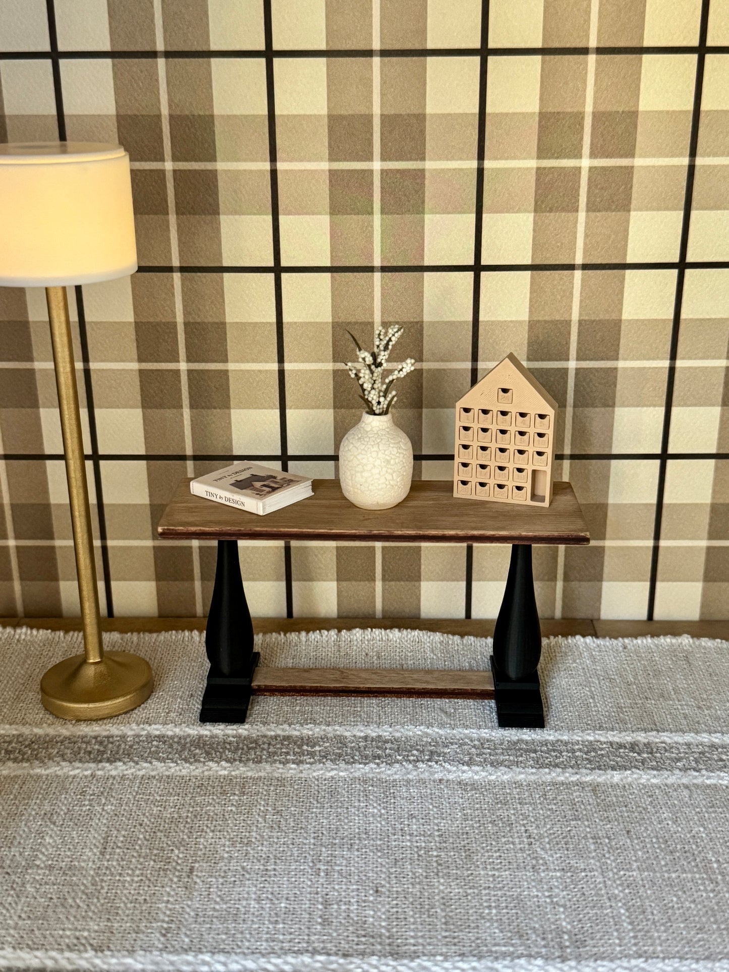 Miniature wood console table with black legs