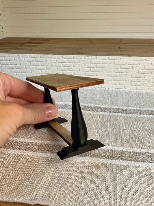 Miniature wood console table with black legs